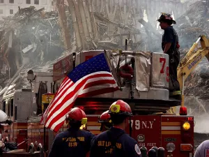 9 11 Prints: New York firefighters and Salt Lake City search and rescue crews gather at the at the collapsed World Trade Center