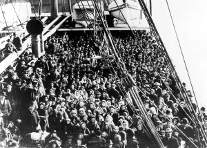 Ellis Island Prints: NEW YORK: Immigrants on an Atlantic liner approach the golden door to the new world at Ellis Island in 1906