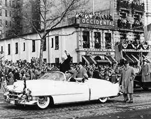 Lcgr1412 Prints: Newly inaugurated President Dwight Eisenhower waves to crowds from an open car