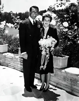 Groom Prints: Newlyweds CARY GRANT and BARABARA HUTTON happily pose for the cameras