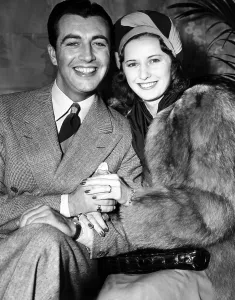 Movie Stars Prints: Newlyweds ROBERT TAYLOR and BARBARA STANWYCK after their surprise elopement, ca. 1939