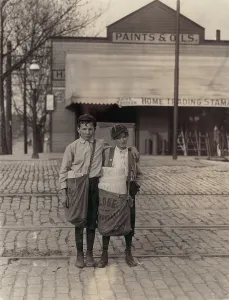 Train Tracks Prints: Two newsboys, from original caption: The boy with bag