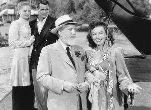 Alexis Prints: NIGHT AND DAY, from left, Alexis Smith, Cary Grant, Monty Woolley, Ginny Simms, 1946