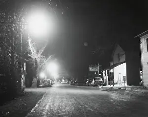 Lcgr1409 Prints: Night scene in a newly electrified town somewhere in rural American. Ca. 1940