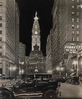 Convertible Prints: Night view of Broad Street with illuminated tower of City Hall