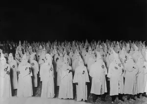 Nativists Prints: Nocturnal gathering of robed and hooded Ku Klux Klan men in 1921-1922
