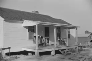 Swing Prints: Nolan Pettway and his family on their new front porch, Gees Bend, Alabama, May 1939