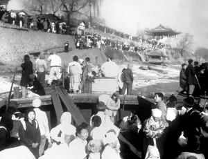 Survival Prints: North Korean refugees are evacuated by ferry boats on the Taedong River at Pyongyang