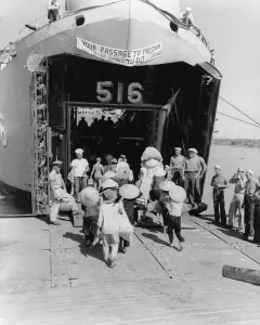 War Victims Prints: North Vietnamese refugees board an US ship bound for Saigon