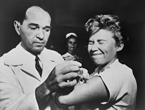 Shot Prints: A nurse at Montefiore Hospital receives a flu vaccination in 1957
