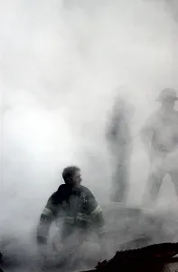 Skyscraper Prints: NYC Fireman emerges from the smoke and debris of the World Trade Center on Sept