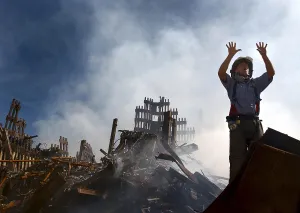 Skyscraper Prints: NYC Fireman signals for 10 more rescue workers to come into the rubble of the Ground Zero