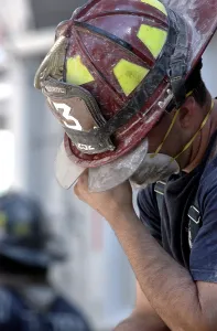 Skyscraper Prints: NYC Fireman takes a break during the rescue operations on Sept. 14, 2001