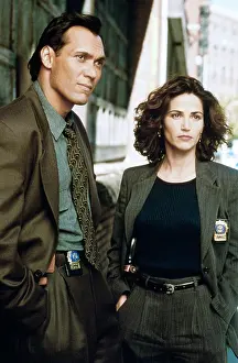 : NYPD BLUE, from left, Jimmy Smits, Kim Delaney, 1993-2005 (1995 photo)