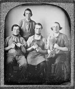 Hammer Prints: Occupational group portrait of four cobblers