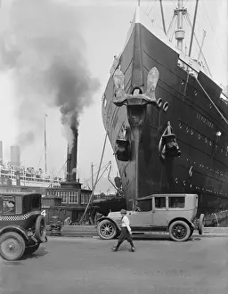 Automobiles Prints: The ocean liner Leviathan at a New York City pier, c. 1920s