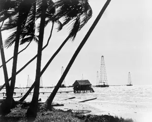 Venezuela Prints: Oil derricks off the shore in Maracaibo Lake