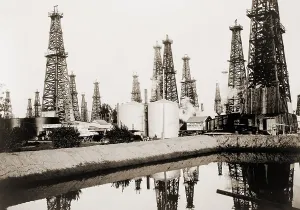 Wells Prints: Oil derricks in Santa Fe Springs, California. 1923