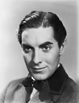 IN OLD CHICAGO, Tyrone Power, 1937, TM & Copyright 20th Century Fox Film Corp./courtesy Everett Collection