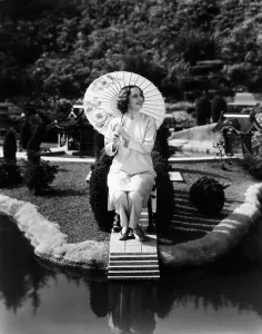 Parasol Prints: Olivia de Havilland, in a Chinese garden, ca. 1936
