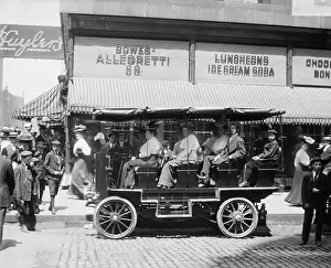 Speed Prints: Open tourist bus in Chicago, at Monroe and State Street, c. 1910-1915 (BSLOC_2018_2_131)