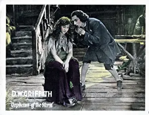 Frank Prints: ORPHANS OF THE STORM, US lobbycard, from left: Dorothy Gish, Frank Puglia, 1921