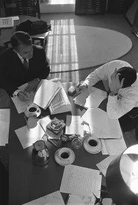 Press Prints: Overhead view of Jack Valenti and Joseph Califano preparing President Johnson's 1966 State of the Union Address