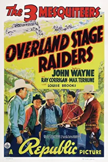 3ev In Prints: OVERLAND STAGE RAIDERS, bottom from left: John Wayne, right: Ray Corrigan, 1938