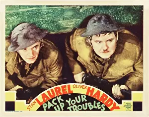 Images Dated 25th September 2013: PACK UP YOUR TROUBLES, l-r: Stan Laurel, Oliver Hardy on lobbycard, 1932