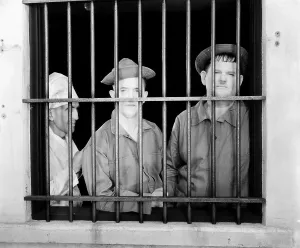 Prison Uniform Prints: PACK UP YOUR TROUBLES, Stan Laurel (center), Oliver Hardy (right), 1932