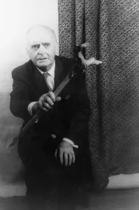 Folklore Prints: Padraic Colum (1881-1972) holding walking stick