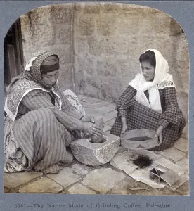 Coffee Prints: Palestine, two women seated, one with mortar & pestle