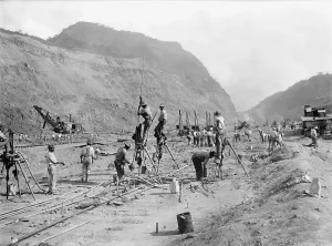 Excavation Prints: Panama Canal construction showing workers drilling holes for dynamite in bedrock
