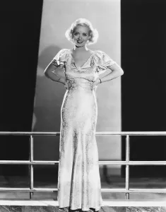 Images Dated 27th February 2008: PARACHUTE JUMPER, Bette Davis, in a blue satin gown by Orry-Kelly, 1933
