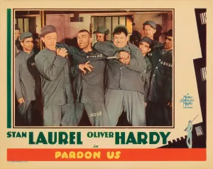 Hardy Prints: PARDON US, lobbycard, front, from left: Stan Laurel, Walter Long, Oliver Hardy, 1931
