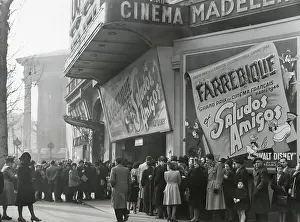Lcgr1501 Prints: Parisiennes at a movie theater showing the Disney film