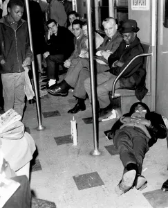 Asleep Prints: Passengers on a stalled subway train during a power failure