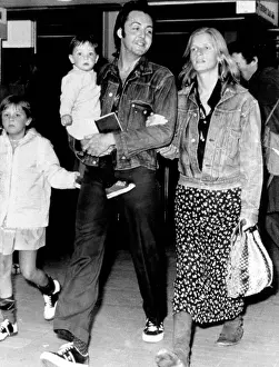 2002 Prints: Paul and Linda McCartney with children Heather and Mary at airport, 1971