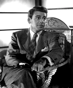 Sitting In Chair Prints: Paul Muni, portrait ca. 1945