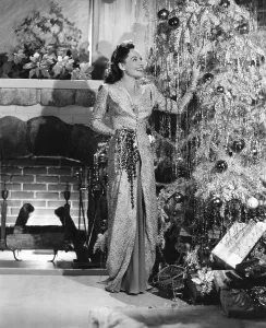 Christmas Tree Prints: Paulette Goddard decorating her Christmas tree, 1940