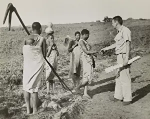 Farming Prints: Peace Corps volunteer meeting four village women working in fields