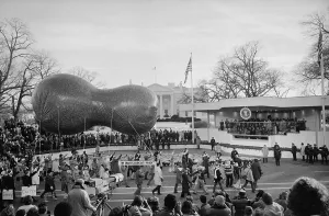 Public Event Prints: Peanut-shaped float passes by reviewing stand for the inauguration of President Jimmy Carter