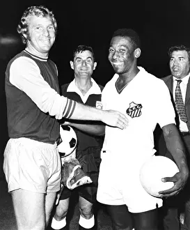 Three Quarters Length Prints: Pele of Santos of Brazil with Bobby Moore