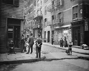 Chinatown Prints: Pell Street in New York City's Chinatown with several Chinese men in traditional dress