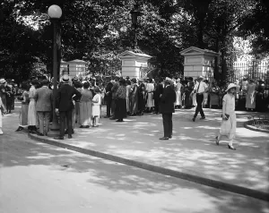Gates Prints: People gather at gates of the White House to pay a last tribute to Calvin Coolidge