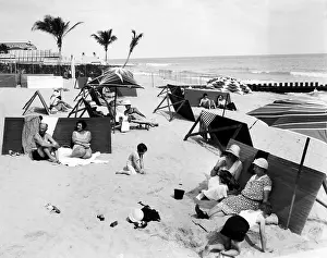 Beach Prints: People relaxing at the shore in Palm Beach