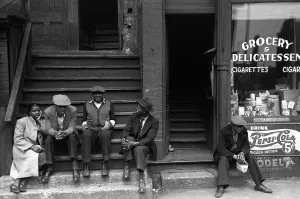 Sidewalk Prints: People sitting on front porches in Negro section of Chicago