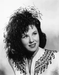 Feathers In Hair Prints: PERILOUS HOLIDAY, Ruth Warrick, 1946