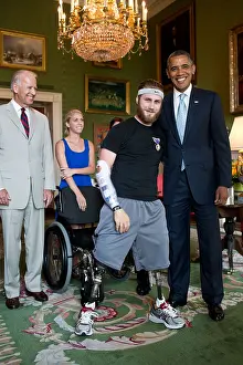 Disabled Prints: Petty Officer Taylor Morris was presented with a Purple Heart by Pres
