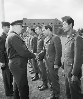 Immigration Prints: Pfc. William Wada, a Japanese American soldier is awarded the Bronze Star Medal for heroism